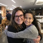 Hugging my friend Abby at her going away party