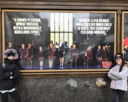 Me and Ari "Shonelle" standing by our poster