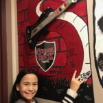 Posing with my signature