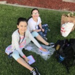 Gabriella "Sophie" and I siting on the grass prior to the show